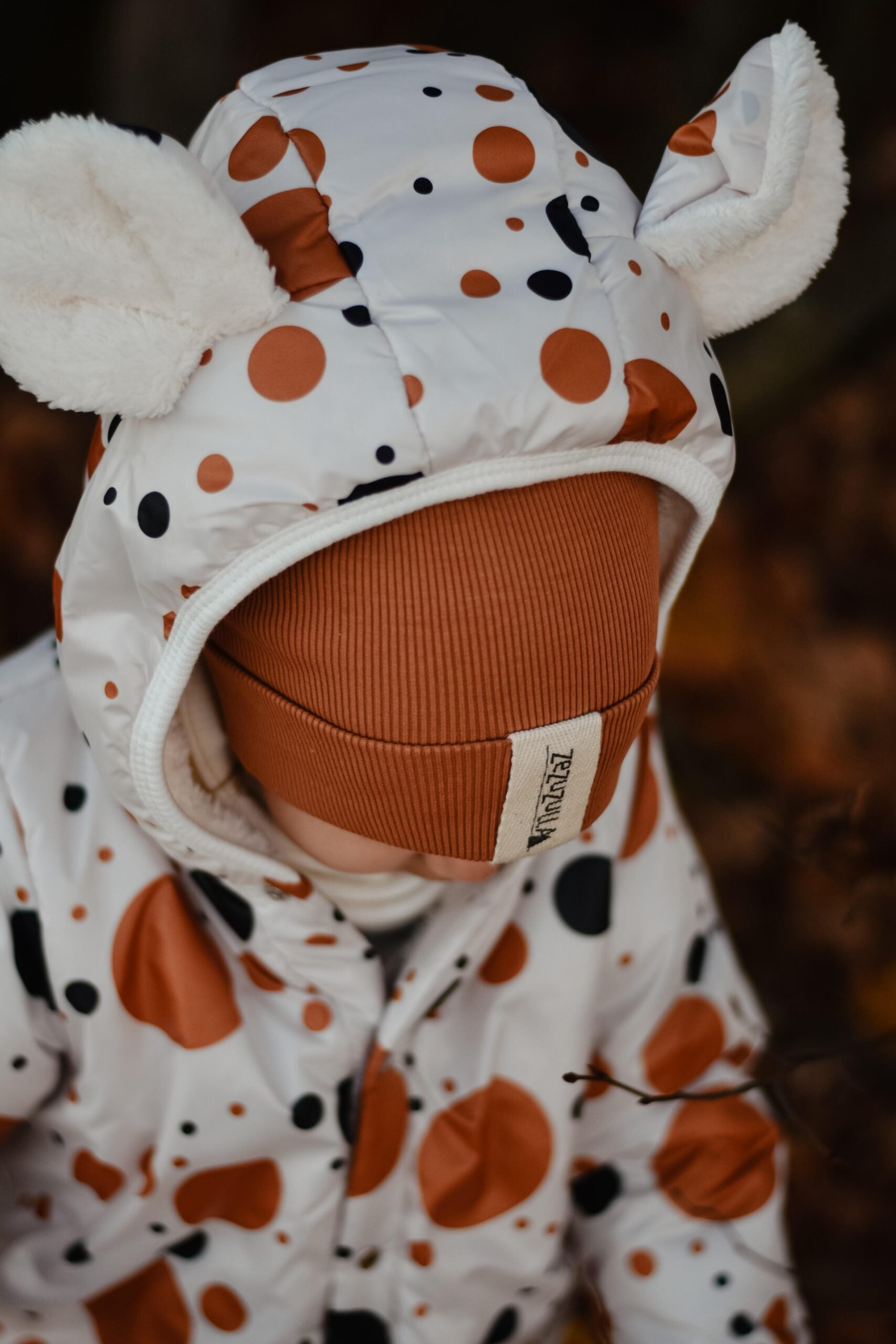 Winter Jumpsuit with Teddy Lining for Babies and Kids - Black and Orange Dots